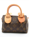 Pre-Loved Mini Speedy Handbag Monogram Coated Canvas Mini with Gold Hardware, Brown