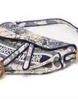 Pre-Loved Saddle Shoulder Bag Toile de Jouy Canvas Medium with Aged Gold Hardware, Beige and Blue