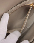 Pre-Loved Triomphe Shoulder Bag Leather Teen with Gold Hardware, Greige