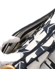 Pre-Loved Saddle Shoulder Bag Star Canvas Medium with Aged Gold Hardware, Navy and White