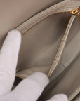 Pre-Loved Triomphe Shoulder Bag Leather Teen with Gold Hardware, Greige