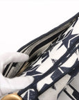 Pre-Loved Saddle Shoulder Bag Star Canvas Medium with Aged Gold Hardware, Navy and White