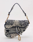 Pre-Loved Saddle Shoulder Bag Toile de Jouy Canvas Medium with Aged Gold Hardware, Beige and Blue