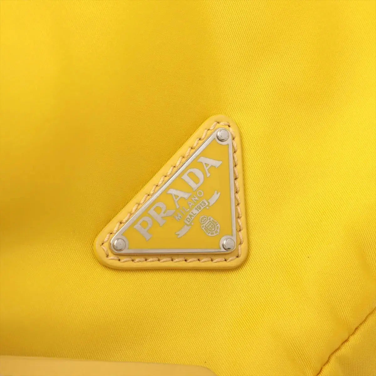 Pre-Loved Padded Nylon Triangle Sling Sling Bag Nylon with Silver Hardware, Yellow