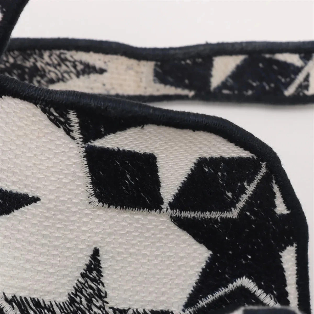 Pre-Loved Saddle Shoulder Bag Star Canvas Medium with Aged Gold Hardware, Navy and White