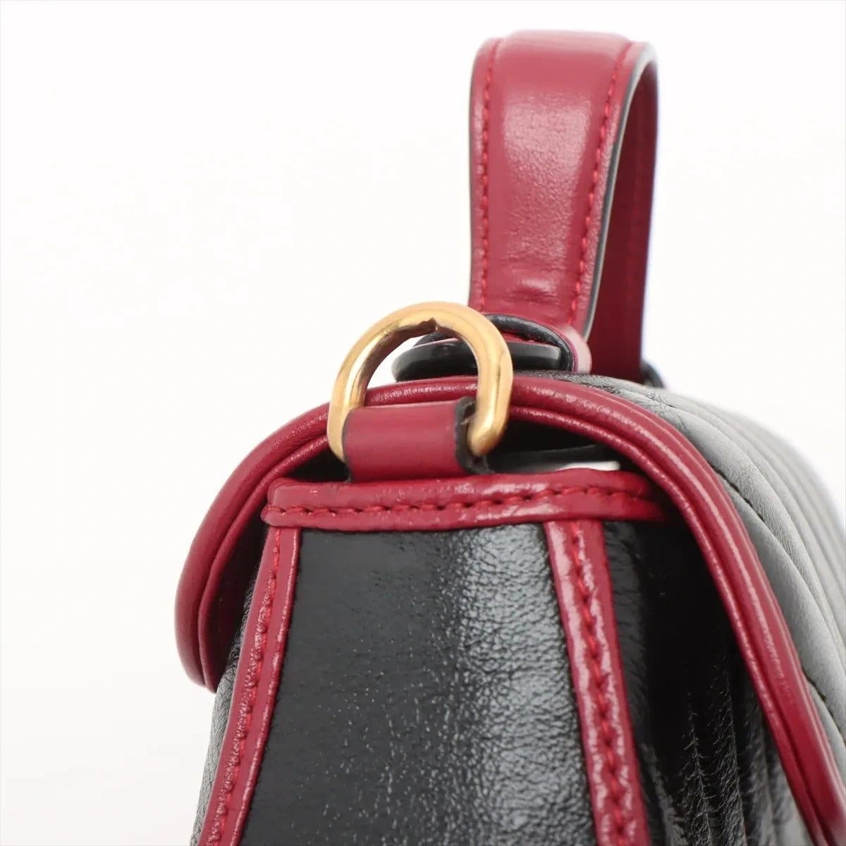 Pre-Loved GG Marmont Top Handle Handbag Quilted Leather Mini with Gold Hardware, Black