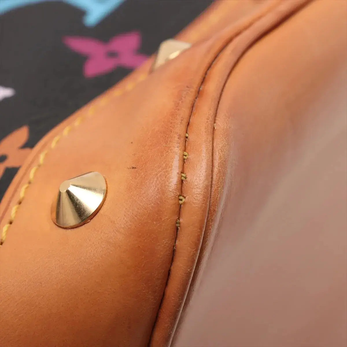 Pre-Loved Alma Handbag Monogram Coated Canvas PM with Gold Hardware, Black Multicolor