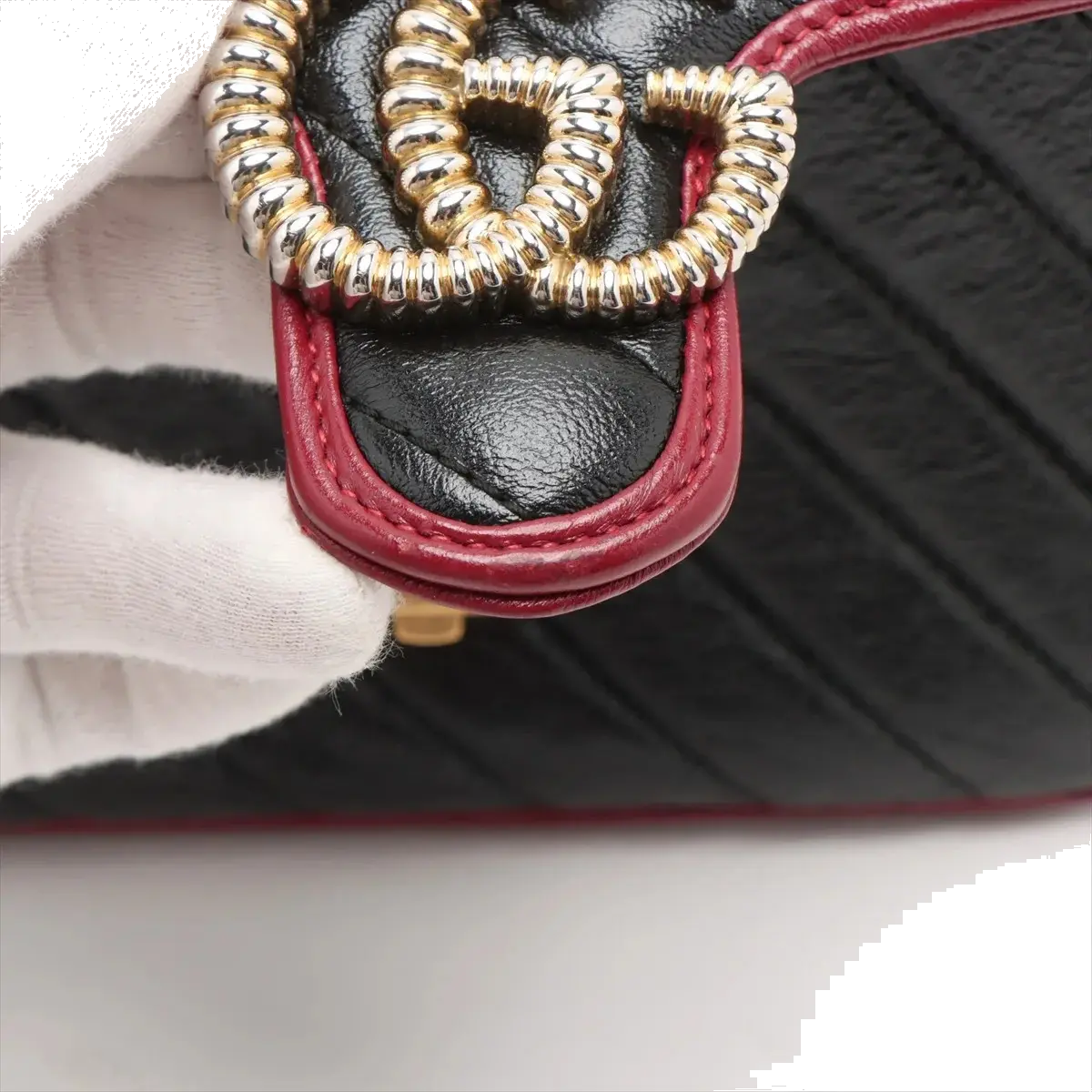 Pre-Loved GG Marmont Top Handle Handbag Quilted Leather Mini with Gold Hardware, Black