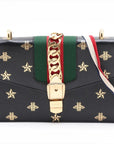 Pre-Loved Sylvie Bee Star Shoulder Bag Bee and Star Print Leather Small with Gold Hardware, Black