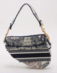 Pre-Loved Saddle Shoulder Bag Toile de Jouy Canvas Medium with Aged Gold Hardware, Beige and Blue