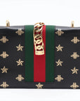 Pre-Loved Sylvie Bee Star Shoulder Bag Bee and Star Print Leather Small with Gold Hardware, Black
