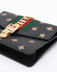 Pre-Loved Sylvie Bee Star Shoulder Bag Bee and Star Print Leather Small with Gold Hardware, Black