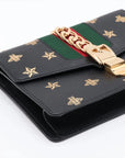 Pre-Loved Sylvie Bee Star Shoulder Bag Bee and Star Print Leather Small with Gold Hardware, Black