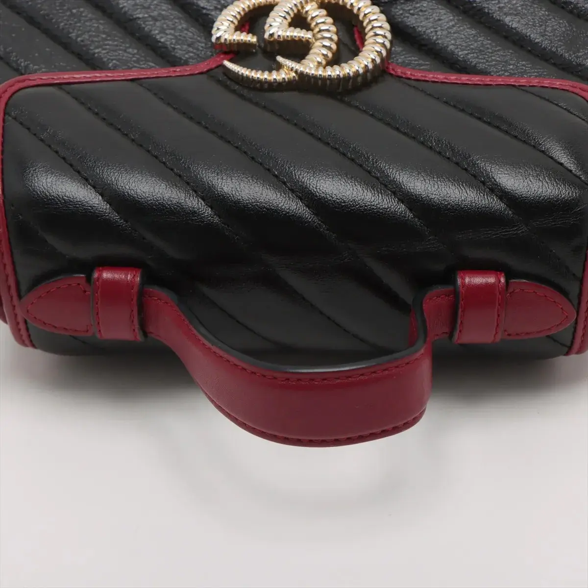 Pre-Loved GG Marmont Top Handle Handbag Quilted Leather Mini with Gold Hardware, Black