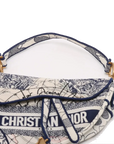 Pre-Loved Saddle Shoulder Bag Toile de Jouy Canvas Medium with Aged Gold Hardware, Beige and Blue