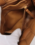 Pre-Loved Padded Cassette Crossbody Bag Intrecciato Leather Small with Gold Hardware, Tan