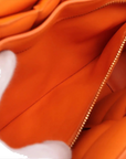 Pre-Loved Padded Cassette Crossbody Bag Intrecciato Leather with Gold Hardware, Orange