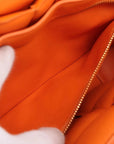 Pre-Loved Padded Cassette Crossbody Bag Intrecciato Leather with Gold Hardware, Orange