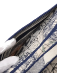 Pre-Loved Saddle Shoulder Bag Toile de Jouy Canvas Medium with Aged Gold Hardware, Beige and Blue