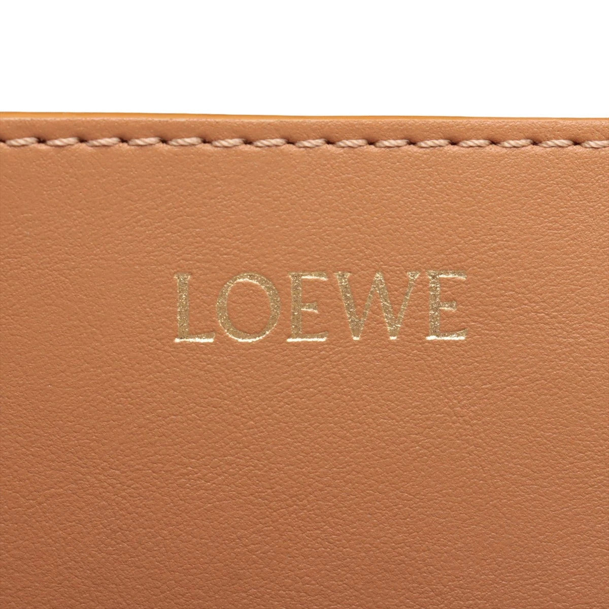 Pre-Loved Puzzle Fold Tote Leather, Tan
