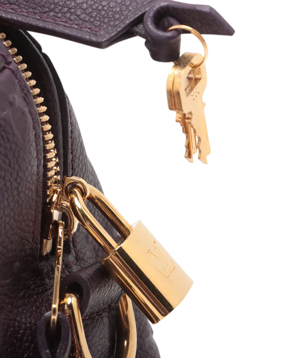 Pre-Owned Louis Vuitton Monogram Empreinte Speedy Bandouliere 25 M40765